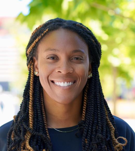 A professional headshot of Dr. Maxine Umeh Garcia. 